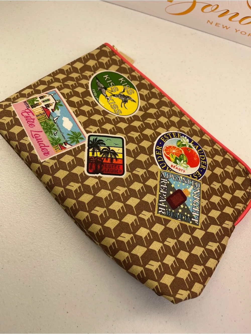 Estee Lauder Brown Patterned Cosmetic Pouch with Travel Patch Accents set of 3!
